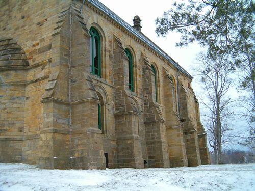 Side elevation including buttresses, Convocation Hall, Kings-Edgehill School, Windsor, NS, 2005.; Heritage Division, NS Dept. of Tourism, Culture and Heritage, 2005