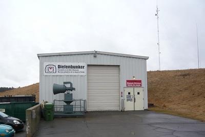 Entrance of the bunker with surrounding landscape; Parks Canada | Parcs Canada