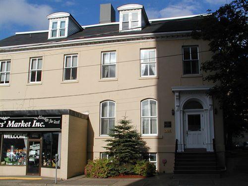 Honourable William Annand House, north half entrance with entablature, arched transom, glazed wood door, round headed windows on first storey, Halifax, Nova Scotia, 2005.; Heritage Division, NS Dept. of Tourism, Culture and Heritage, 2005.