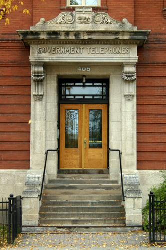 View of the main entrance of the St. John's Telephone Exchange, Winnipeg, 2005; Historic Resources Branch, Manitoba Culture, Heritage and Tourism, 2005