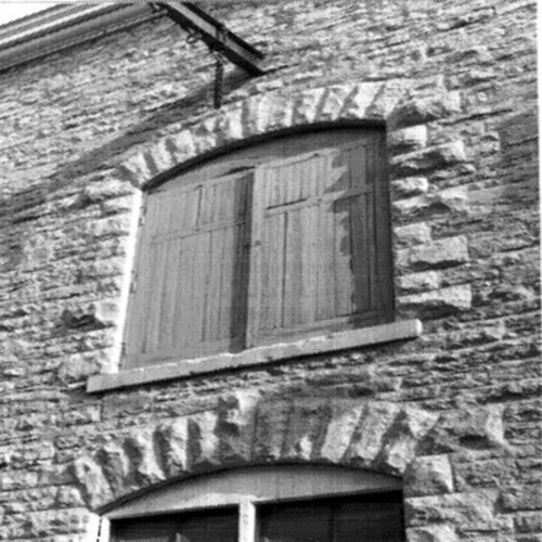 Ottawa Hydro Generating Station No. 2, detail of the second floor service door on the north elevation, April 1992.; E. Tumak, AHB, CPS