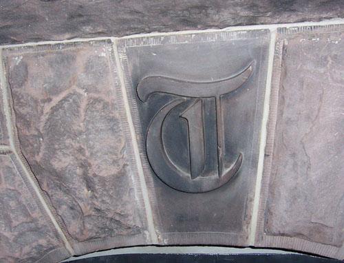 Inlaid monogram in a foyer; Town of Shediac