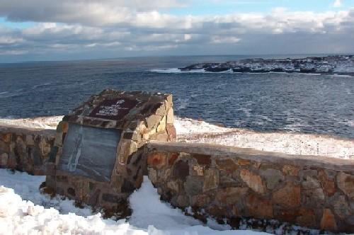 Blessing of the Fleet Site monument and rock wall in Flatrock, NL commemorating the homily and blessing of the community’s fleet of boats by Pope John Paul II on 1984/09/12.  Photo taken 2005/12/09.; HFNL/Lara Maynard 2005.