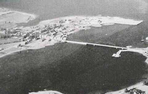 Historic photo with the Lanigan and Bowser Mill Site in the upper right portion of photo, 1945; Village of Rexton