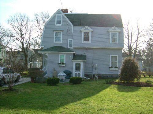 Rear (north) elevation of Thomas V.B. Bingay House, Yarmouth, NS, 2006.; Heritage Division, NS Dept of Tourism, Culture and Heritage, 2006