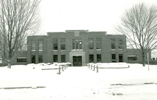 General view of the Stable Building front façade, 1985.; Parcs Canada | Parks Canada, 1985.