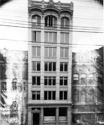 Front view of the Saxe Building main façade.; National Archives of Canada | Archives nationales du Canada, PA-9196.