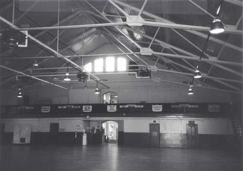 Interior view of the Armoury, 1986.; Department of National Defence/Ministère de la défense nationale, 1986.