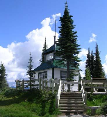 View of the façade and north elevation showing its modest size and two-storey wood frame construction.; Parks Canada Agency / Agence Parcs Canada, 2011