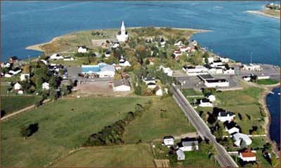 An aerial view of St. Andrew's St. Andrew's United Church and a section of the Village of Rexton.; Village of Rexton