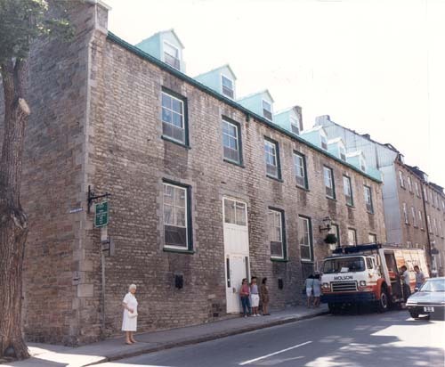 Corner view of Monk House, showing the front façade, 1988.; National Defence / Défense nationale, 1988.