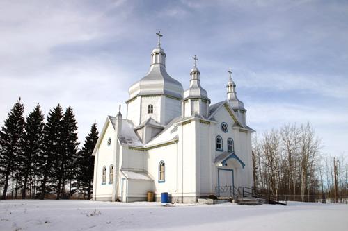 Primary elevations, from the southeast, of St. Nicholas Ukrainian Catholic Church, Rackham area, 2006; Historic Resources Branch, Manitoba Culture, Heritage and Tourism, 2005