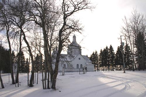 Contextual view, from the northeast, of St. Nicholas Ukrainian Catholic Church, Rackham area, 2006; Historic Resources Branch, Manitoba Culture, Heritage and Tourism 2005