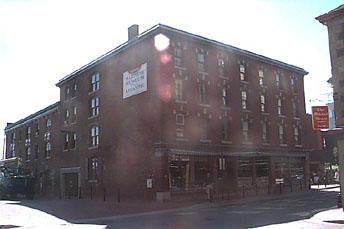 Robertson's Hardware & Warehouse, storefront and warehouse view, different roof line heights, brick commercial style, Halifax, Nova Scotia, 2000.; HRM Planning and Development Services, Heritage Property Program, 2000.