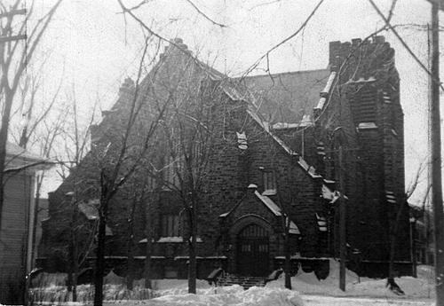 This photo from possibly the 1930's demonstrates that the Central United Church has changed very little of its exterior architectural features since its construction in 1916.; Moncton Museum