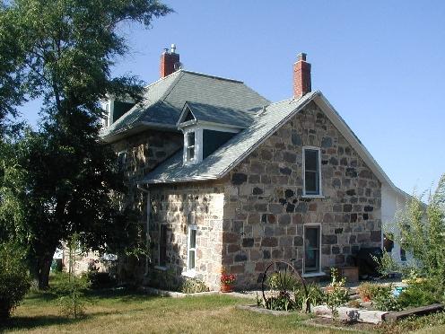South elevation with view of hip and gable roofline, 2005.; Government of Saskatchewan, Lindy Thorsen, 2005.