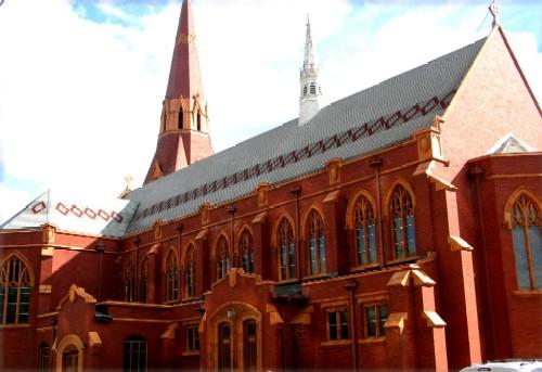View of the rear and side of St. John's Anglican Cathedral highlighting the exterior of the sanctuary, 2005.; City of Saskatoon, Kathlyn Szalasznyj, 2005.