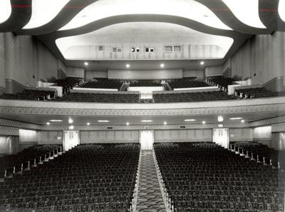 Interior view of Vogue Theatre, showing the streamlined Moderne design of the interior, evident in the sinuous, sweeping curves of the auditorium.; Vancouver Public Library, Historical Photo Collection, 16418.