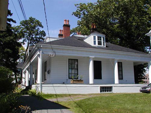 Caldwell-Hill House, black widnow in center, wide three sided veranda with Doric columns, Halifax, Nova Scotia, 2005.; HRM Planning and Development Services, Heritage Property Program, 2005.
