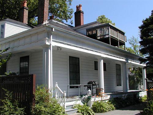 Caldwell-Hill House, four chimneys, flat hip roof with four sides, Doric columns, Halifax, Nova Scotia, 2005.; HRM Planning and Development Services, Heritage Property Program, 2005.