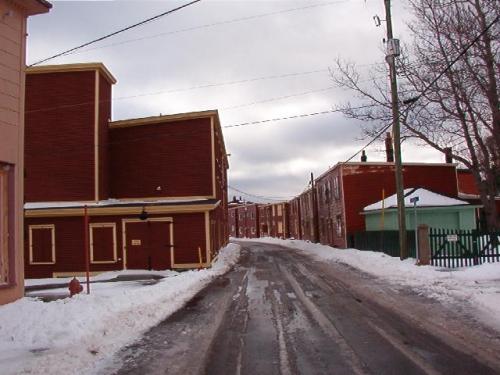Eastern view of Port Union Municipal Heritage District duplexes, Main Street, Port Union, NL.  Photo taken January, 2006.; HFNL/ Lara Maynard 2006.