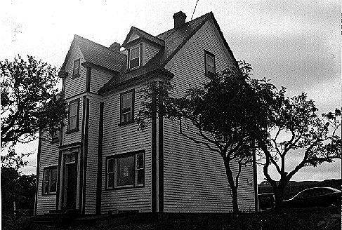 Exterior photo of Reddy House, Marystown.  Photo taken 1996 as part of an inventory.; HFNL 2006.