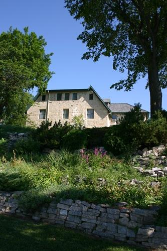 Contextual view from the Red River of the Captain William Kennedy House, Lockport area, 2005;  Historic Resources Branch, Manitoba Culture, Heritage, Tourism and Sport, 2005
