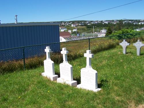 Headstones of Priests, all identical markers; each with a personal message about the deceased.  Photo taken August 2005.; HFNL/ Deborah O'Rielly 2006.