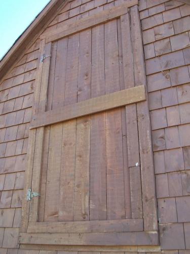 Close up view of the loft door, Burgess Fishing Property.  Photo taken September 8, 2005.; HFNL 2005