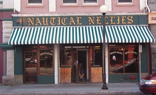 Exterior view of 201 Water Street showing main, storefront level with recessed entrance.  Photo taken July 12, 2006; HFNL/ Deborah O'Rielly 2006
