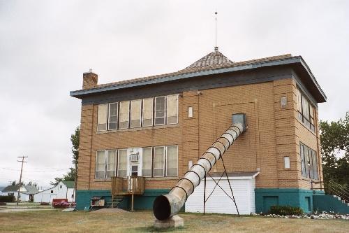 Rear elevation, showing window patterning and unique fire escape slide, 2005.; Christine Kulyk, 2005
