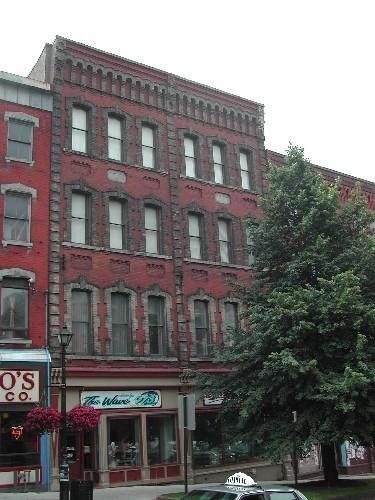 This photograph shows the contextual view of the building and its proximity to the other buildings on King Street, 2004; City of Saint John