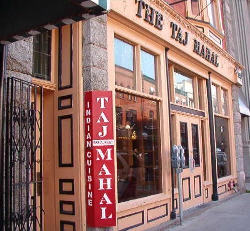 203 Water Street, westward looking view of main storefront facade, showing recessed doorway with panels and stained glass window, plate glass windows, transoms and signband.  Photo taken July 12, 2006.; HFNL/ Deborah O'Rielly 2006.
