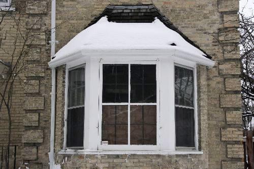 Window detail of the W.M. Ashdown House, Winnipeg, 2006; Historic Resources Branch, Manitoba Culture, Heritage and Tourism, 2006