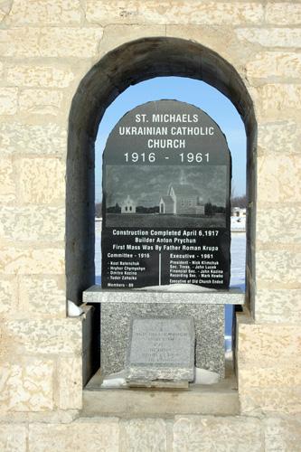 Detail view of the plaque, of the Bell Tower of the Ukrainian Catholic Church of St. Michael the Archangel, Tyndall, 2005; Historic Resources Branch, Manitoba Culture, Heritage, Tourism and Sport, 2005