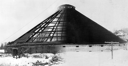 This composite photo shows the steel support beams, as well as the completed structure.; Moncton Museum