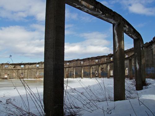 Ironically, the Roman arena-inspired design by R. C. Donald now emulates Roman ruins in its current state.; Moncton Museum