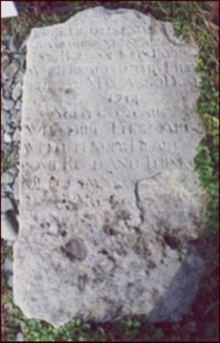 The original sandstone gravemarker from John Parot's Grave Municipal Heritage Site, Old Perlican, NL. Photo taken 2004.; © Baccalieu Trail Heritage Corporation 2006