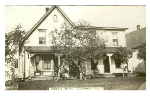 Showing west elevation before addition of third floor; Private Collection