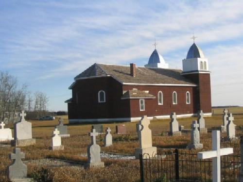 View of church and cemetery at St. Mary's Church and Site from north-west corner of site, 2005.; Government of Saskatchewan, Michael Thome, 2005.