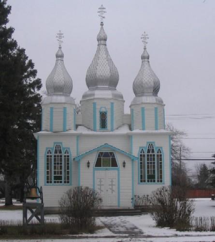 View of east elevation of Holy Trinity Ukrainian Greek Orthodox Church, east elevation featuring the entryway and spires, 2005.; Government of Saskatchewan, Michael Thome, 2005.