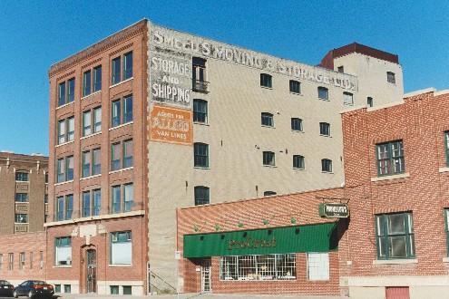 View of front and side elevations from east, showing original signage, 2005.; Ross Herrington, 2005