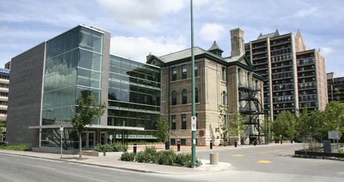Contextual view, from the southwest, showing the original Isbister School, Winnipeg, and the modern addition to the left, 2006; Historic Resources Branch, Manitoba Culture, Heritage, Tourism and Sport, 2006
