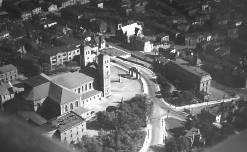Aerial view of the Basilica of St. John the Baptist and the Basilica Archway.  Other ecclesiastical buildings can also be noted in the picture.  Archway is located near the center right.  Date of photo unknown.; City of St. John's Archives 2006