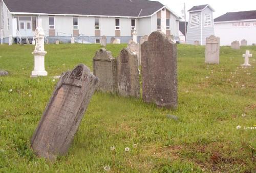 Partial view of Christ Church Churchyard Cemetery with the current Church Church building in the background, Bonavista, NL, 2006/06/14; L Maynard/HFNL 2006