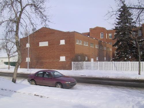 View of the 1946 gymnasium addition from the southwest along 68 Street (March 2006); City of Edmonton, 2006