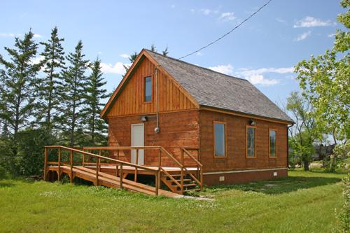Primary elevations, from the southeast, of the Buztynski House, Moosehorn, 2006