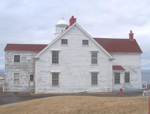 Southwestern facade of Long Point Lightkeeper's Double Dwelling, Crow Head, NL. Photo taken April 2006. ; HFNL/Andrea O'Brien 2006