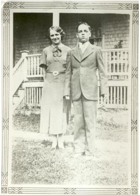 A young Heath MacQuarrie poses in front of his home, n.d.; Victoria Seaport Eco-Museum Collection
