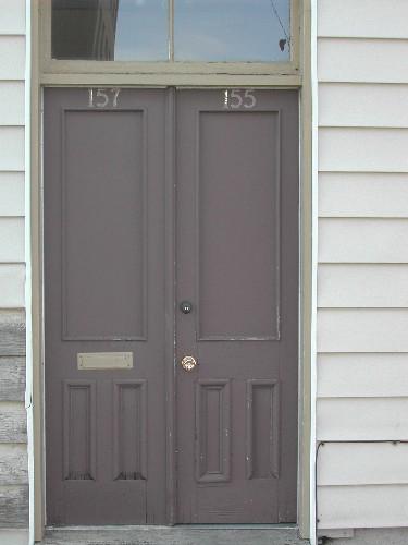 This photograph shows the old double wooden doors at the south entrance, 2004; City of Saint John